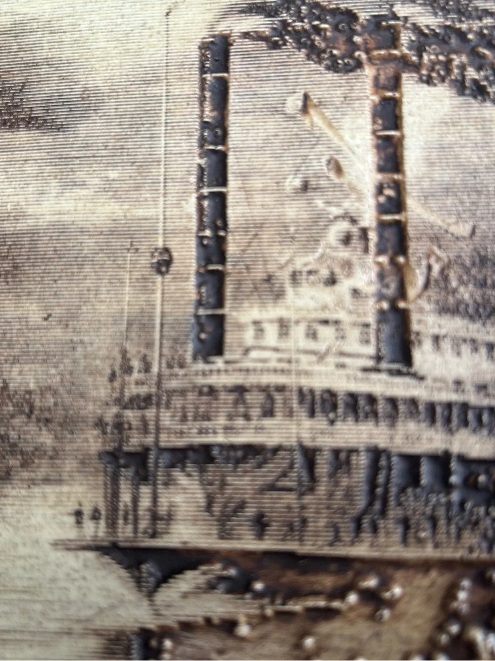 vintage wood-burned or engraved art titled 